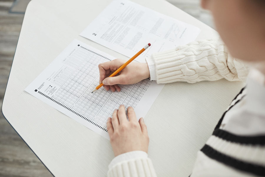 Student filling in answers on a standardized test answer sheet
